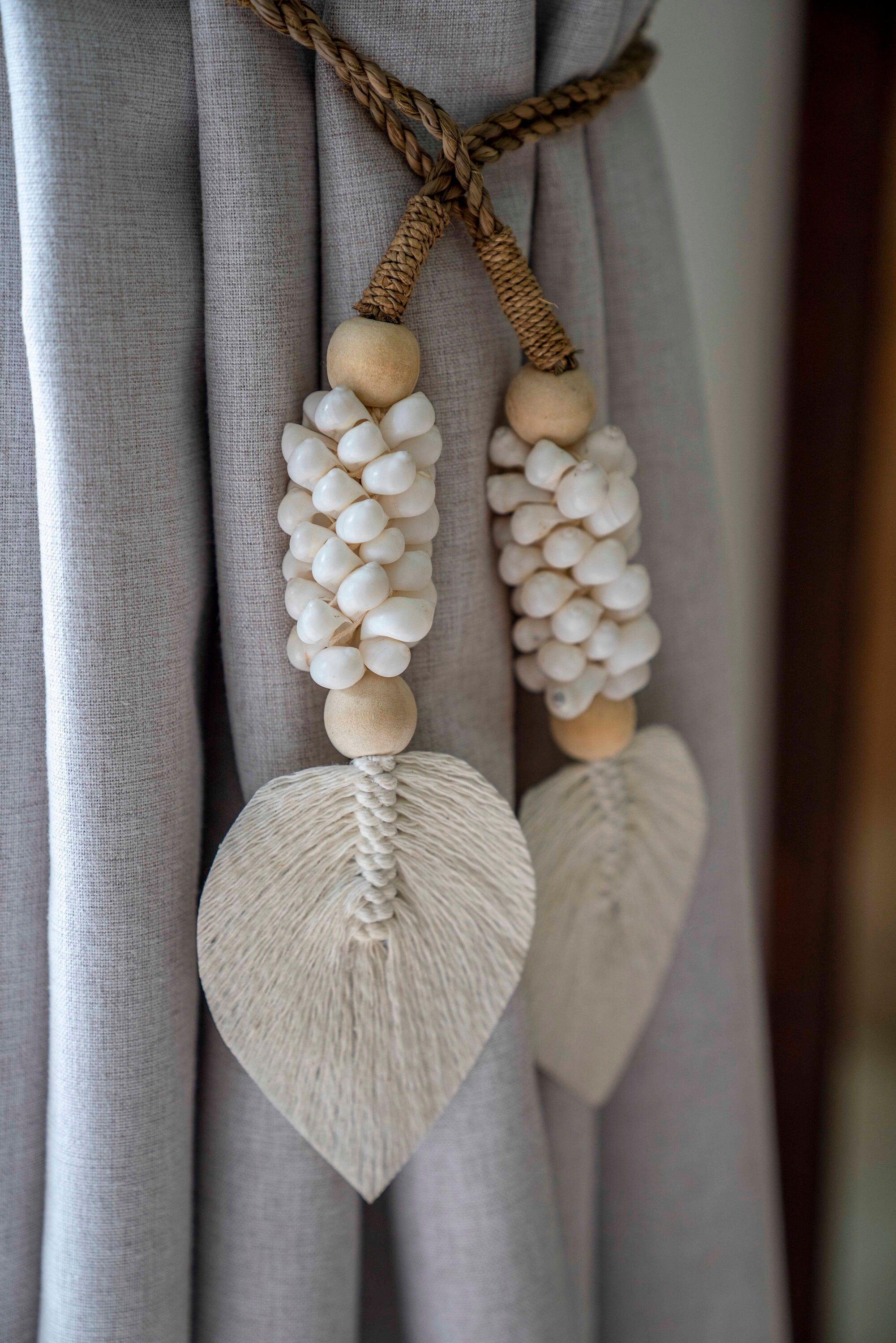 Handcrafted Boho Tassel Decor – Seagrass String with Macrame Leaf, Wooden Beads, and White Moon Shells, 42cm, Made in Bali